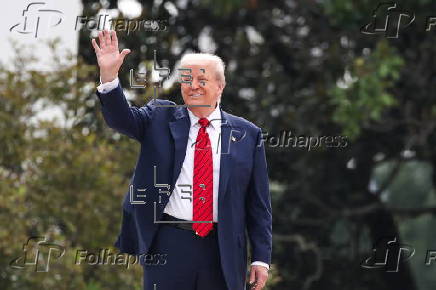 US President Trump walks on roof of the West Wing of the White House