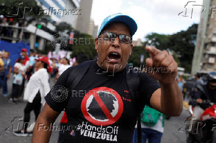 People participate in a march in support of Venezuelan President Nicolas Maduro, in Caracas