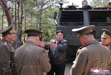 A handout photo shows North Korean leader Kim Jong Un supervise a missile test