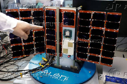 FILE PHOTO: Sateliot's CTO Guadalupi shows a satellite at the Aerospace Technology building in Nigran