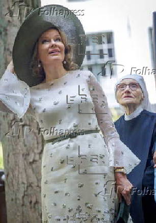 Queen Mathilde of Belgium visits the Beguinage 'Ten Wijngaerde' in Bruges