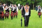 People participate in the Orange Order march along the beach in Rossnowlagh