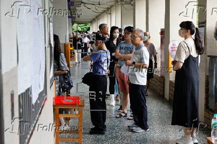 Voters cast their ballots in recall election for several Taiwanese legislators