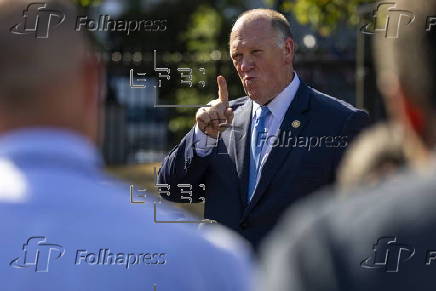 US Border Czar Tom Homan talks with news media outside the West Wing