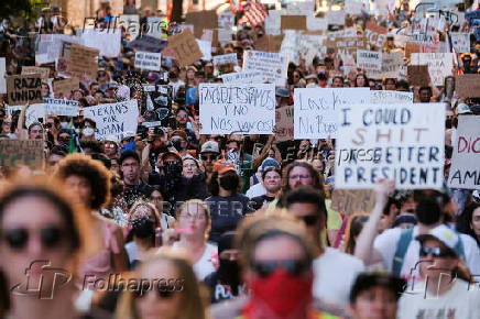 Rally in solidarity with Los Angeles protests against federal immigration sweeps, in Austin