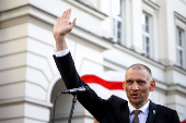Siarhei Tsikhanouski attends a rally organised by Belarusian diaspora in Warsaw