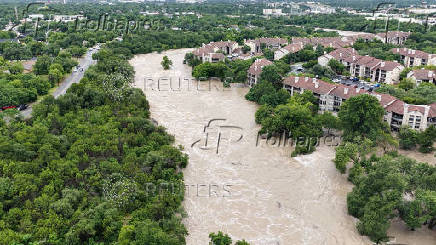 A drone view shows the swollen San Gabriel river, in Georgetown