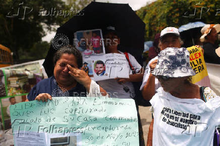 Relatives of imprisoned people under a sweeping state of emergency take part in a protest in Nuevo Cuscatlan