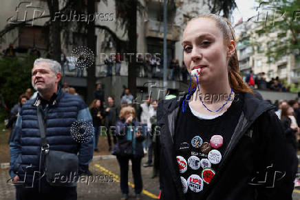 Students block access to the state broadcaster Radio Television of Serbia (RTS), demanding fair and unbiased reporting, in Belgrade