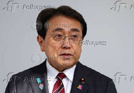 FILE PHOTO: Japan's Economic Revitalization Minister Ryosei Akazawa speaks to the press in Tokyo