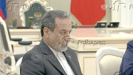 Russian President Vladimir Putin meets with Iranian Foreign Minister Abbas Araqchi in Moscow