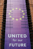 European Union flags flutter outside the European Commission headquarters in Brussels