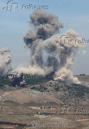 Smoke billows from Nabatieh district, following Israeli strikes, according to two Lebanese security sources, as seen from Marjayoun