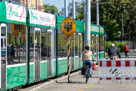 A German Republic sign is pictured during a random check by the German police in a tram at the German-Swiss border in Basel