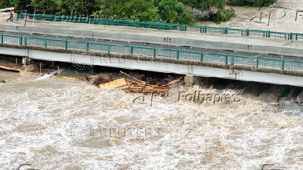 A drone view shows the swollen San Gabriel river, in Georgetown