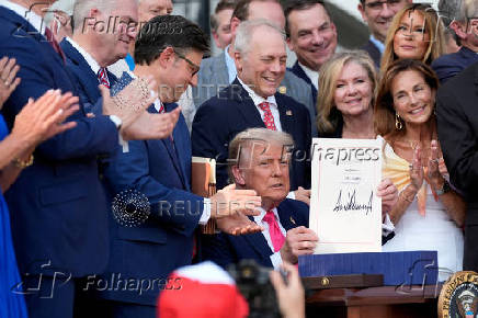 FILE PHOTO: U.S. President Trump signs the 