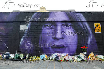 Fans pay tribute following the death of Ozzy Osbourne, in Birmingham