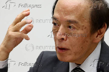 FILE PHOTO: FILE PHOTO: Bank of Japan Governor Kazuo Ueda attends a press conference after a BOJ policy meeting in Tokyo