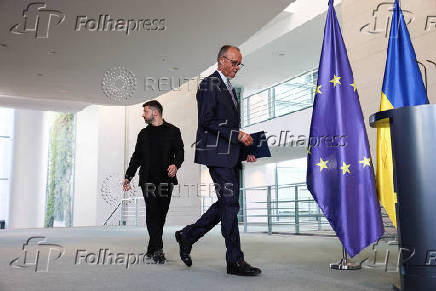 German Chancellor Merz speaks to the media, in Berlin