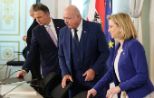 Austrian  Chancellor Stocker, Vice-Chancellor Babler and Foreign Minister Meinl-Reisinger arrive for a press conference in Vienna