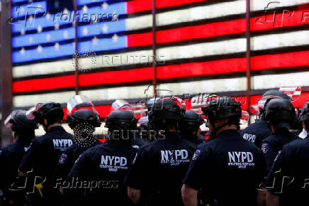 FILE PHOTO: Protesters rally against the death in Minneapolis police custody of George Floyd, in Times Square in New York