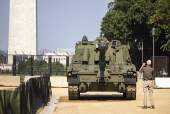 Helicopters and other heavy equipment staged for DC military parade