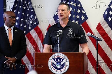 Acting Immigration and Customs Enforcement (ICE) director Todd Lyons attends a press conference, in Los Angeles