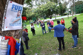 Tributes at place where Colombian Senator Uribe was shot during campaign event, in Bogota