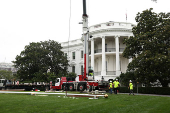 New flagpole is installed on the South Lawn at the White House