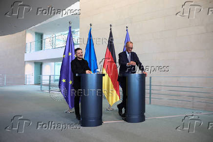 German Chancellor Merz and Ukrainian President Volodymyr Zelenskiy attend a press conference, in Berlin
