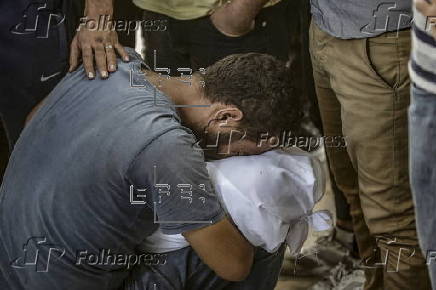 Palestinians mourn family killed in Israeli airstrike on Gaza refugee camp