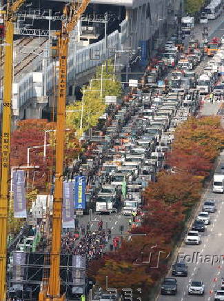 Construction workers rally in Busan to demand higher equipment rental fees