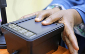 People have their biometrics recorded during voter registration, in Mogadishu