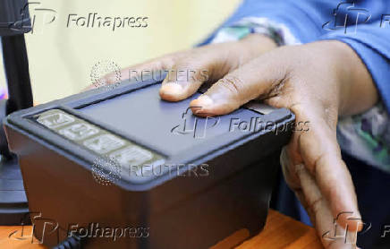 People have their biometrics recorded during voter registration, in Mogadishu