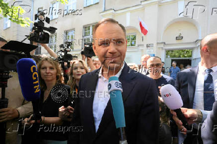 Polish presidential candidate Karol Nawrocki, backed by the main opposition Law and Justice (PiS) party, talks to the press