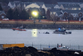 FILE PHOTO: Aftermath of American Eagle flight 5342 crash in the Potomac River near Ronald Reagan Washington National Airport