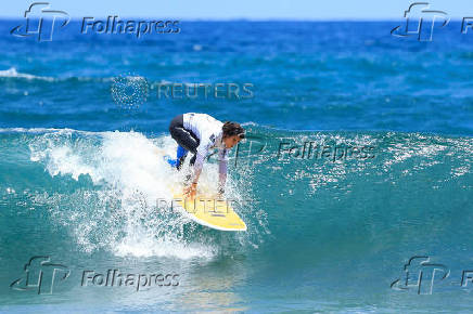 Surfer Mireia Cabanes tries to surf a wave during the adaptive surfing Open LPA Surf City No Limit in Las Palmas de Gran Canaria