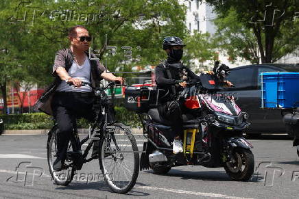 Beijing issues orange alert for heatwave