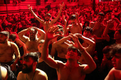 Shi'ite Muslims beat their chests during a religious ritual marking Ashura, the holiest day on the Shi'ite Muslim calendar, in Baghdad