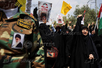 People attend a rally in support of the people of Gaza, after Friday prayers in Tehran