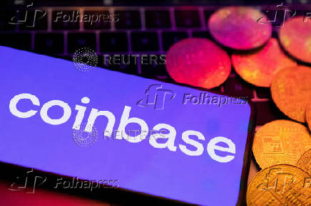 FILE PHOTO: Illustration shows smartphone with displayed Coinbase logo