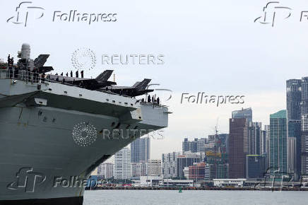 Britain's HMS Prince of Wales aircraft carrier arrives at Marina Bay Cruise Centre in Singapore