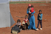 People gather on land between Deraa and Sweida after Druze unrest