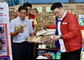 President Ferdinand Marcos visits a relief goods warehouse in Manila as Tropical Storm 'Crising apporaches