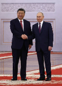 Russian President Putin and Chinese President Xi meet in Moscow