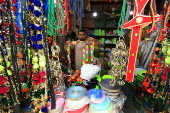 Roadside shop sells ornaments ahead of Eid al-Adha in Peshawar