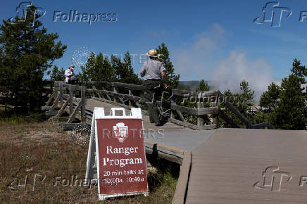 National Park Service Seasonal Interpretation Ranger Denine Northup leads a program at the Fountain Paint Pot geothermal area in Yellowstone National Park