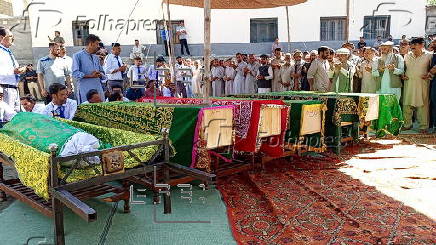 Mass funeral of 8 volunteers killed in a landslide near the Chinese border in Gilgit