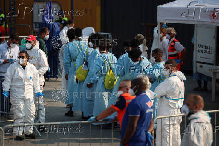 Rescued migrants disembark Sea-Watch 5 ship in Salerno