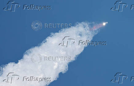 SpaceX's next-generation Starship spacecraft atop its Super Heavy booster is prepared for launch
